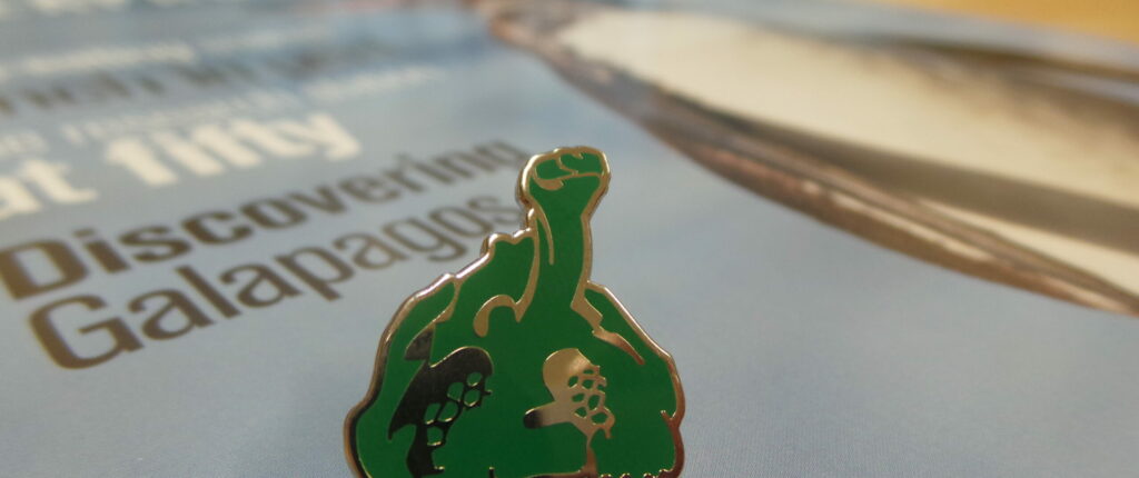 The giant tortoise pin badge you will receive when you join Galapagos Conservation Trust