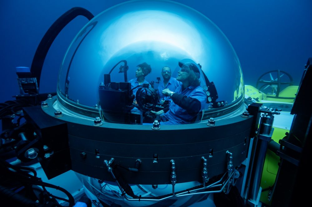 Dr. Sylvia Earle and Salome Buglass, Marine Ecologist at the Charles Darwin Foundation are traveling down in the submersible for an exploratory dive in the twilight zone a couple of miles off Wolf Island © Rolex/Franck Gazzola