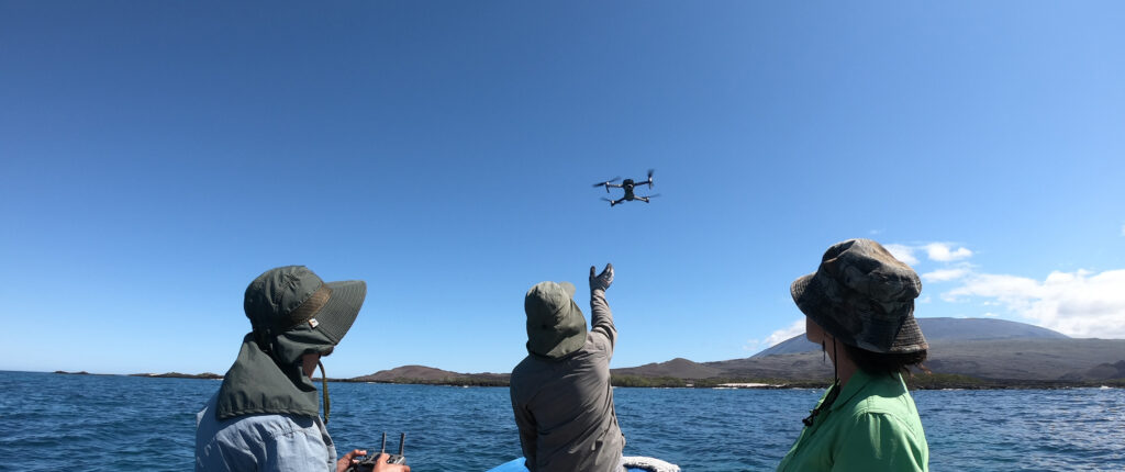 Launching a drone in Galapagos to survey the coastline